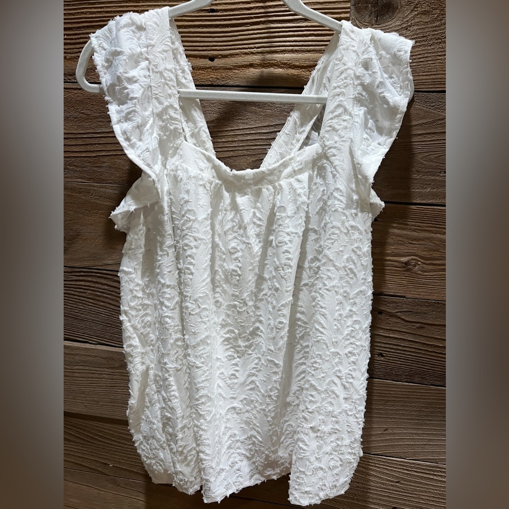 Lauren Conrad white top with cross back design 1x Very good condition